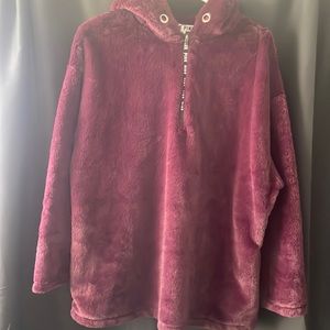 Woman’s fuzzy sweater